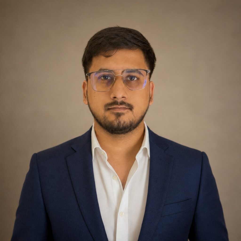 Man in blue suit and glasses, digital transformation consulting